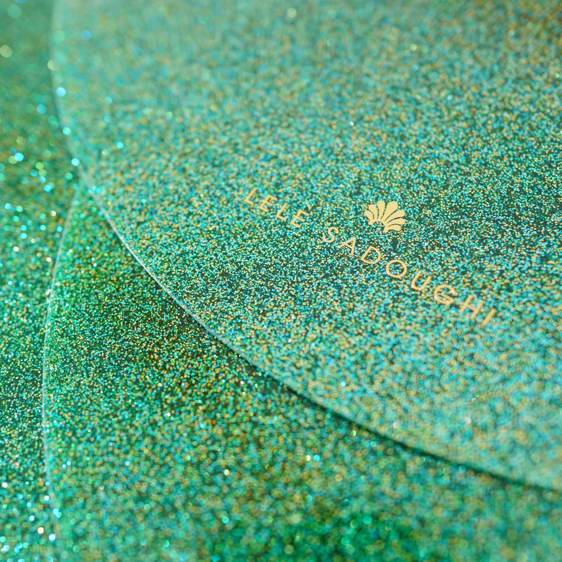 EMERALD GLITTER LUNA ROUND SET OF 4 PLACEMATS