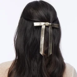 GOLD BARDOT FAUX LEATHER BOW BARRETTE