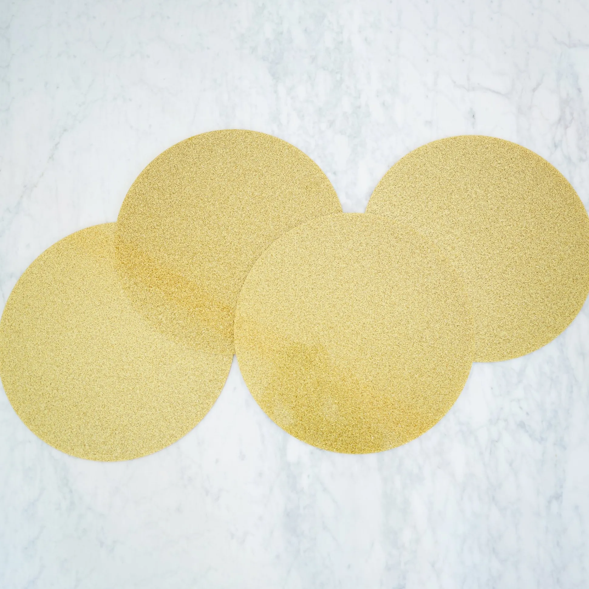 GOLD GLITTER LUNA ROUND SET OF 4 PLACEMATS