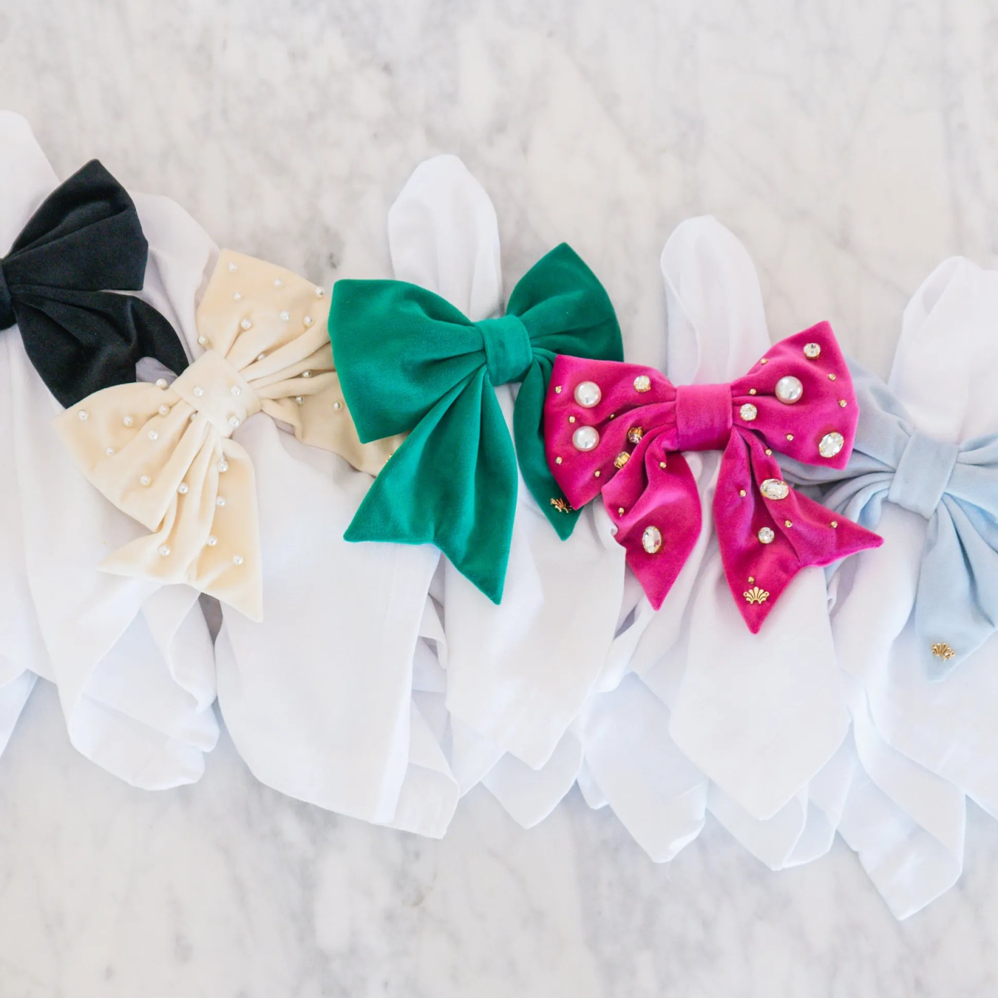 SKY BLUE SET OF 4 VELVET BOW NAPKIN RINGS
